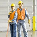 A man and a woman cleaning.