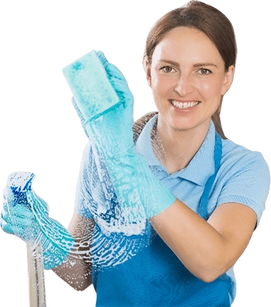 Woman with a sponge smiling.